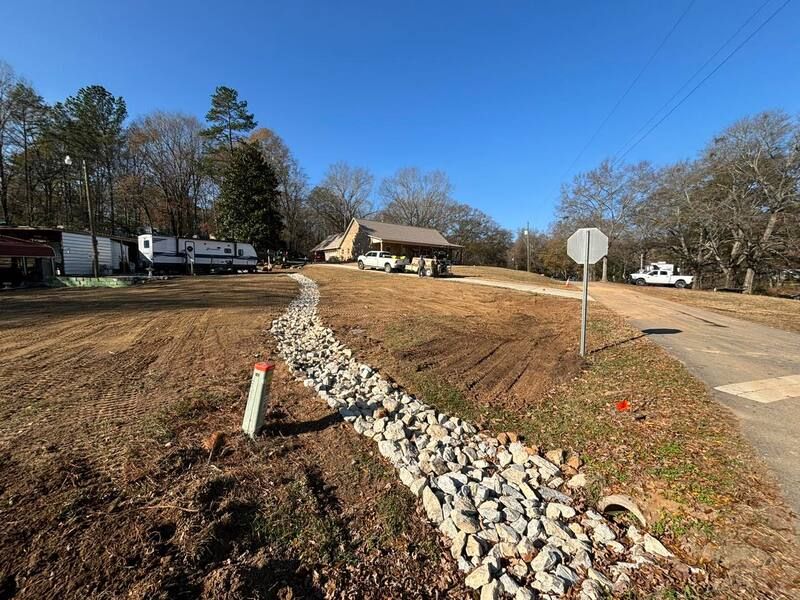 A road with a lot of rocks on the side of it