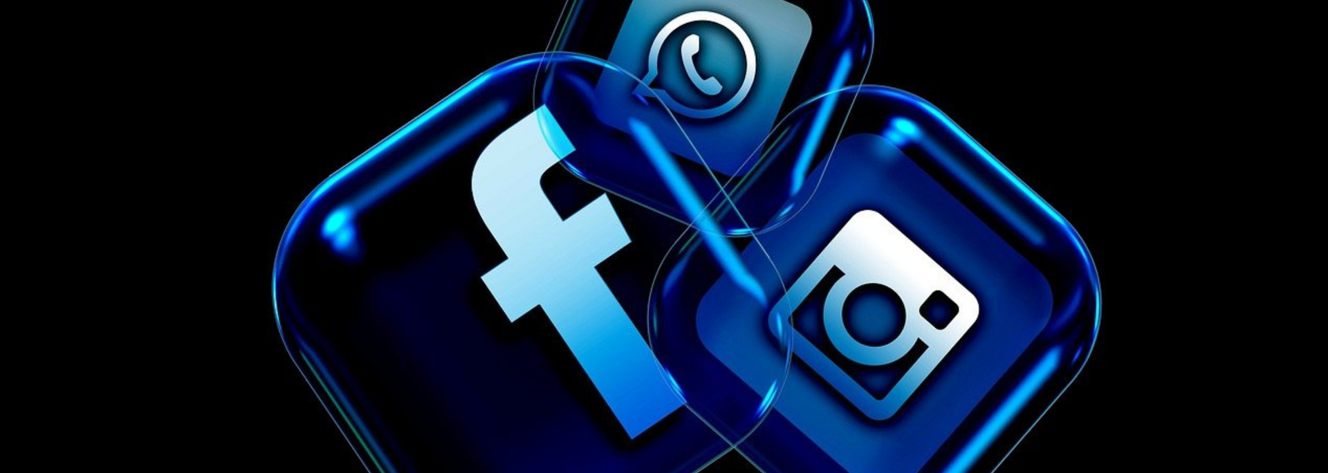 Blue Facebook and Instagram logos with a magnifying glass overlay on a dark background