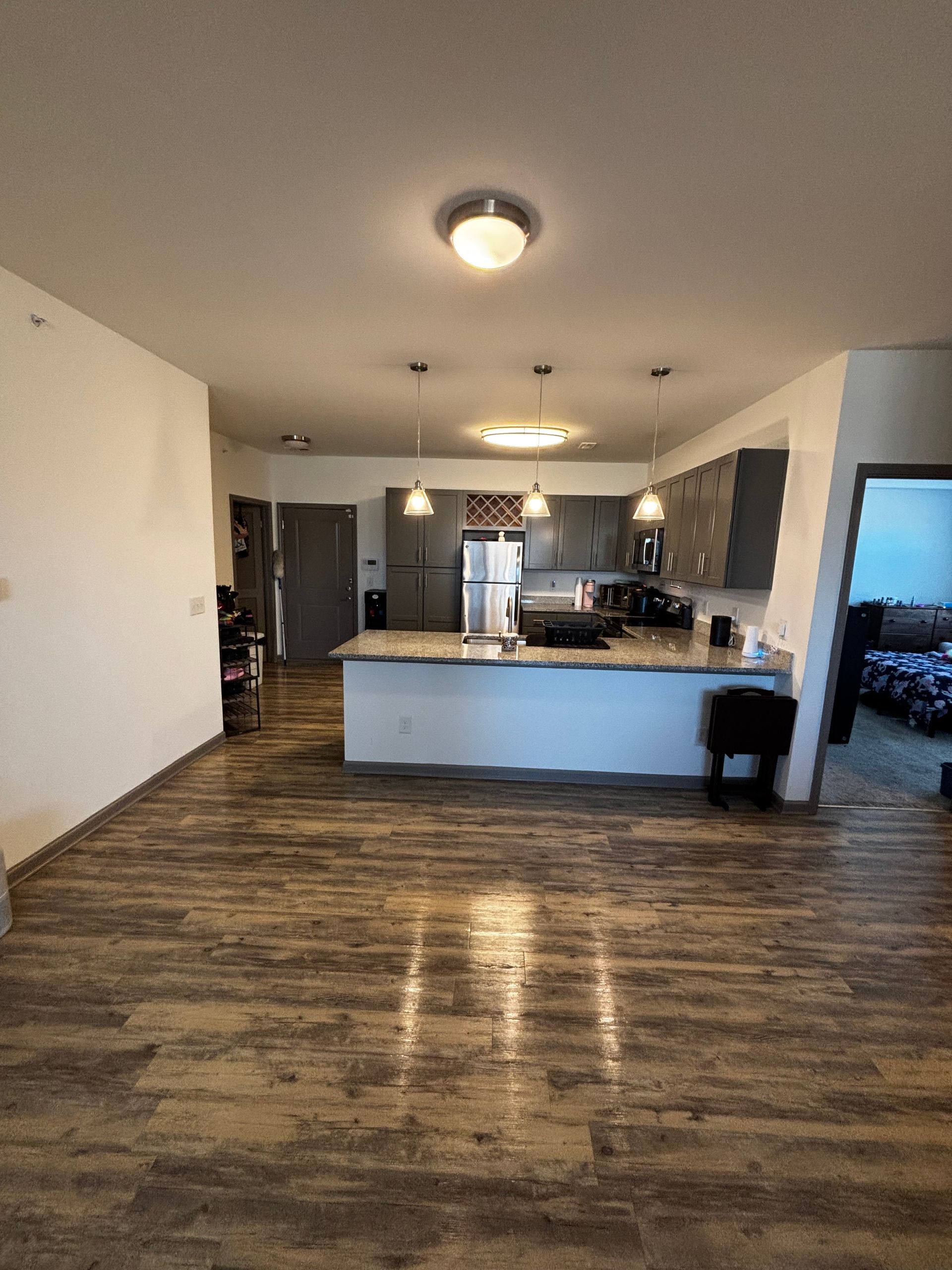 A kitchen with a large island in the middle of the room.