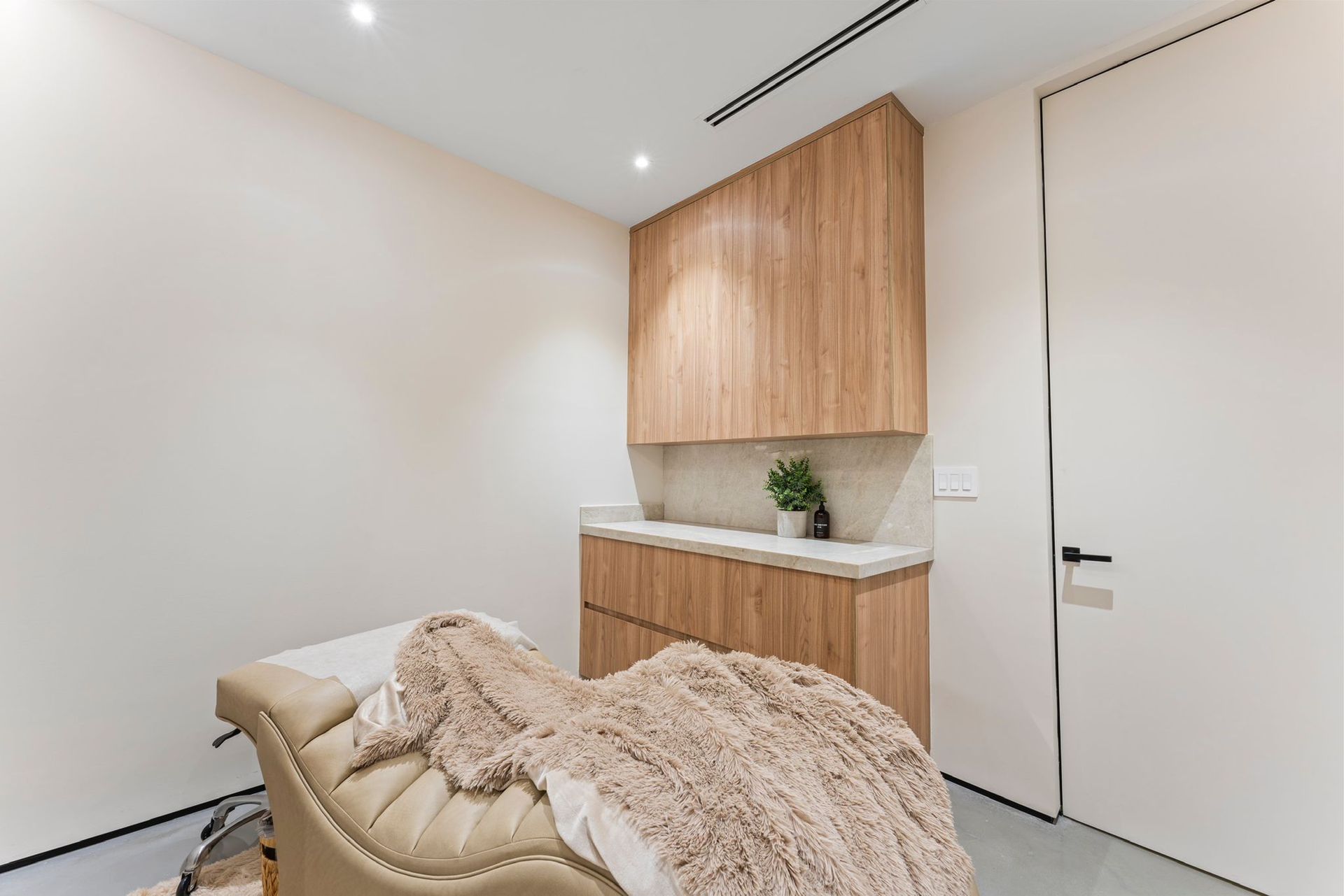 There is a bed in the middle of the room.