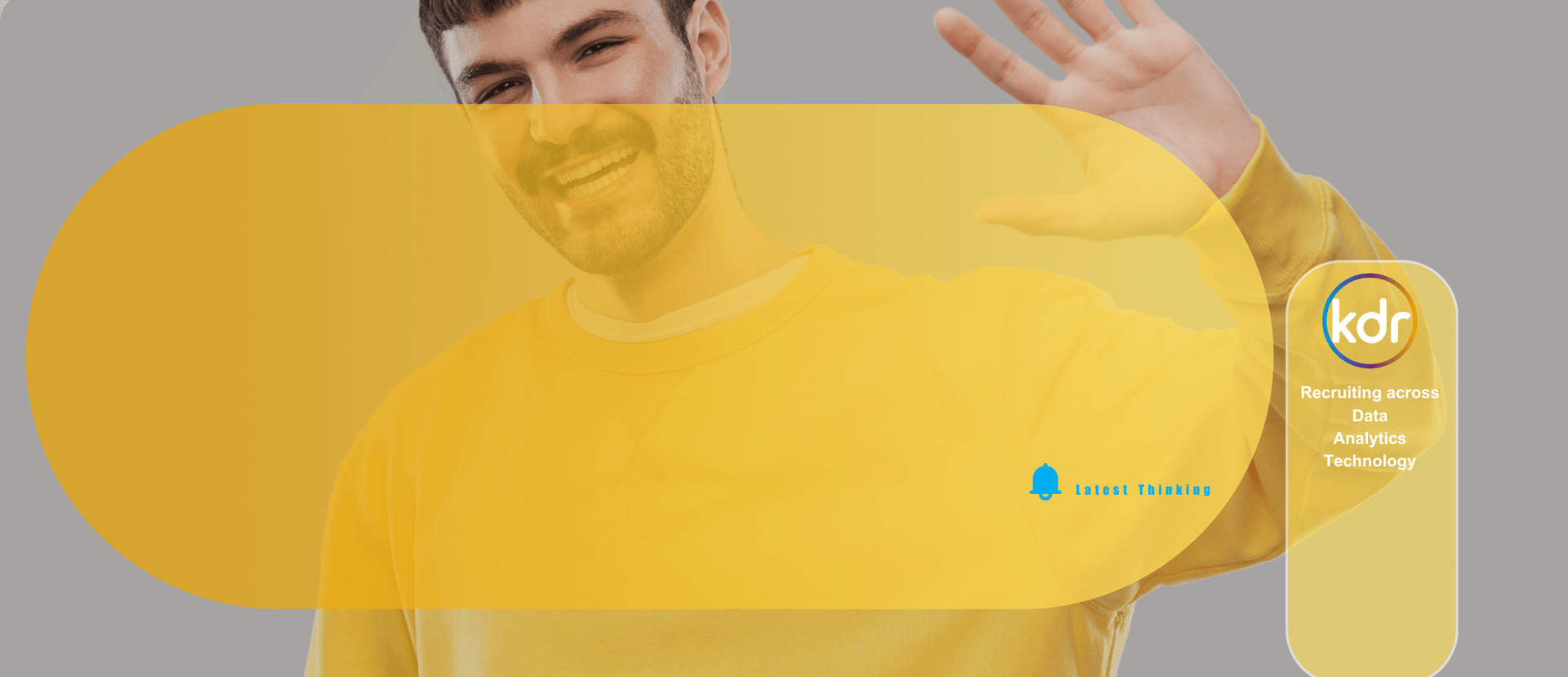 Man in yellow thinking about the data and ai job market trends 