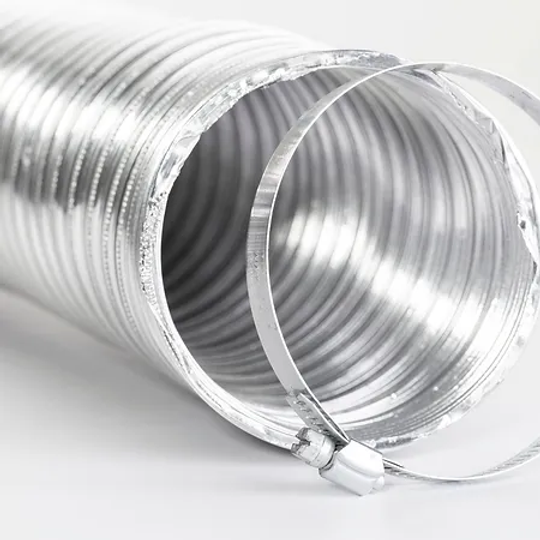 A close up of an aluminum hose on a white surface.