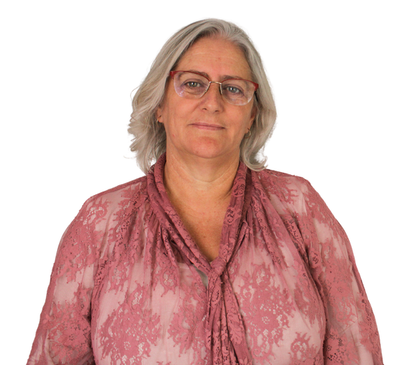 Founder and owner Larissa Darcy smiling to camera.