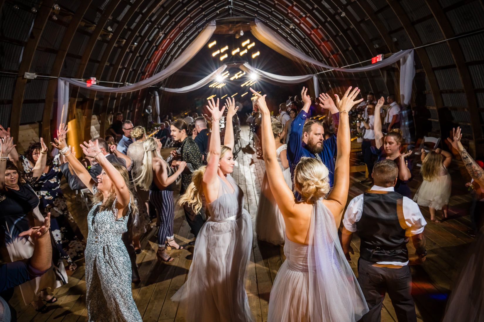 Packed dance floor at Poplar Creek Barn in Oshkosh, Sound Sensations Entertainment