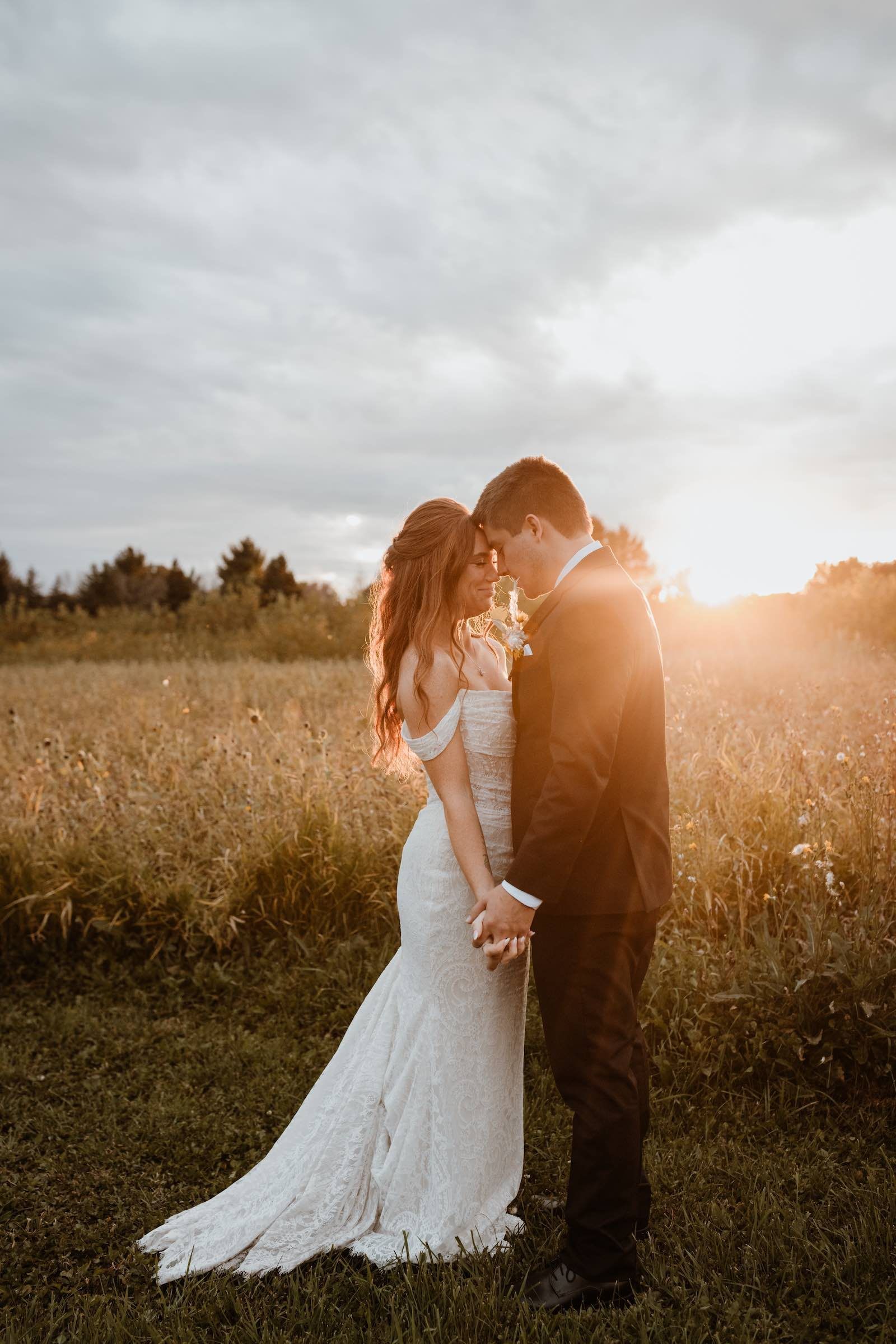 Barn wedding at Poplar Creek and bride and groom together at sunset, with  Sound Sensations entertainment