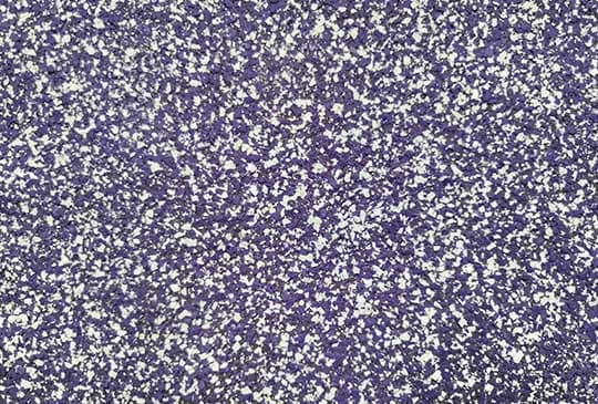 close up purple and white flake flooring
