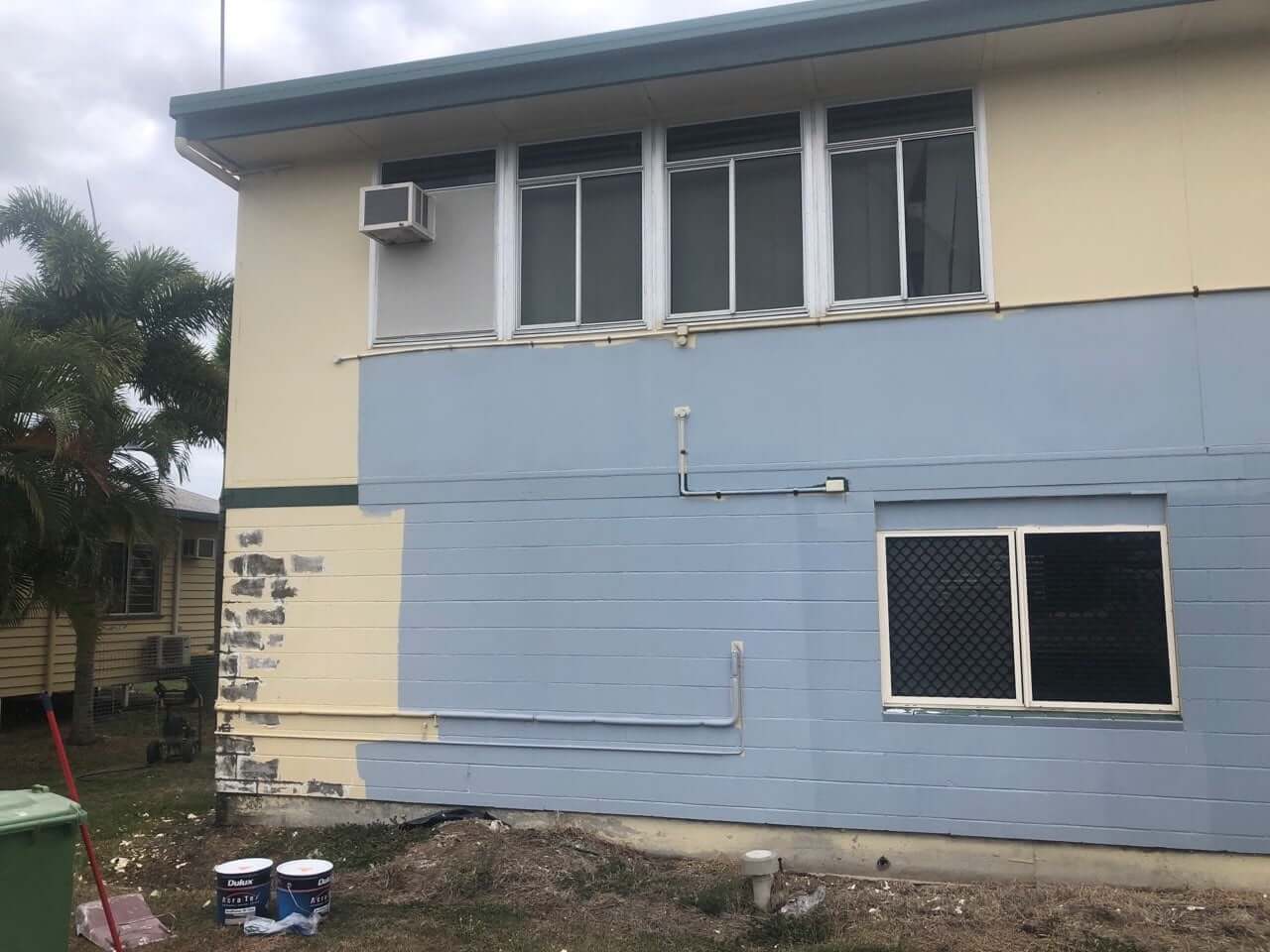 outside commercial brick building painted
