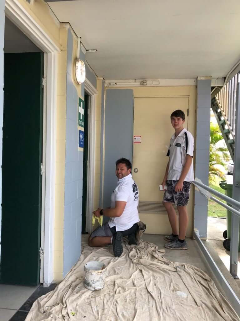 painting door and door frame of building