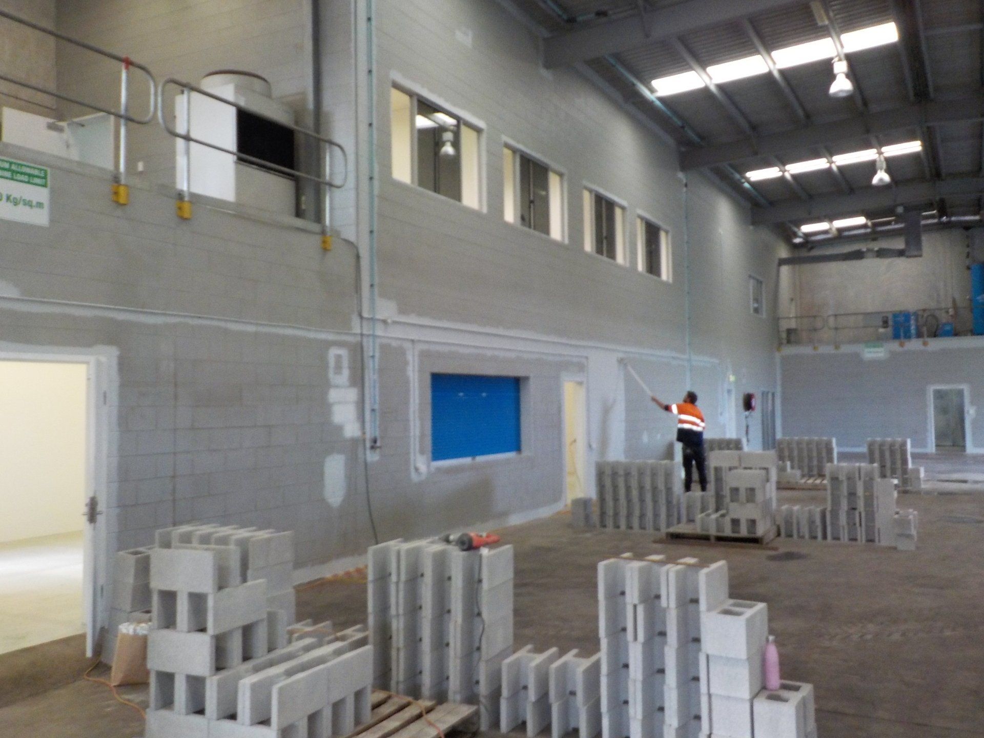 painting inside of warehouse building