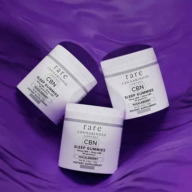 A jar of rare cannabinoid company cbn sleep gummies