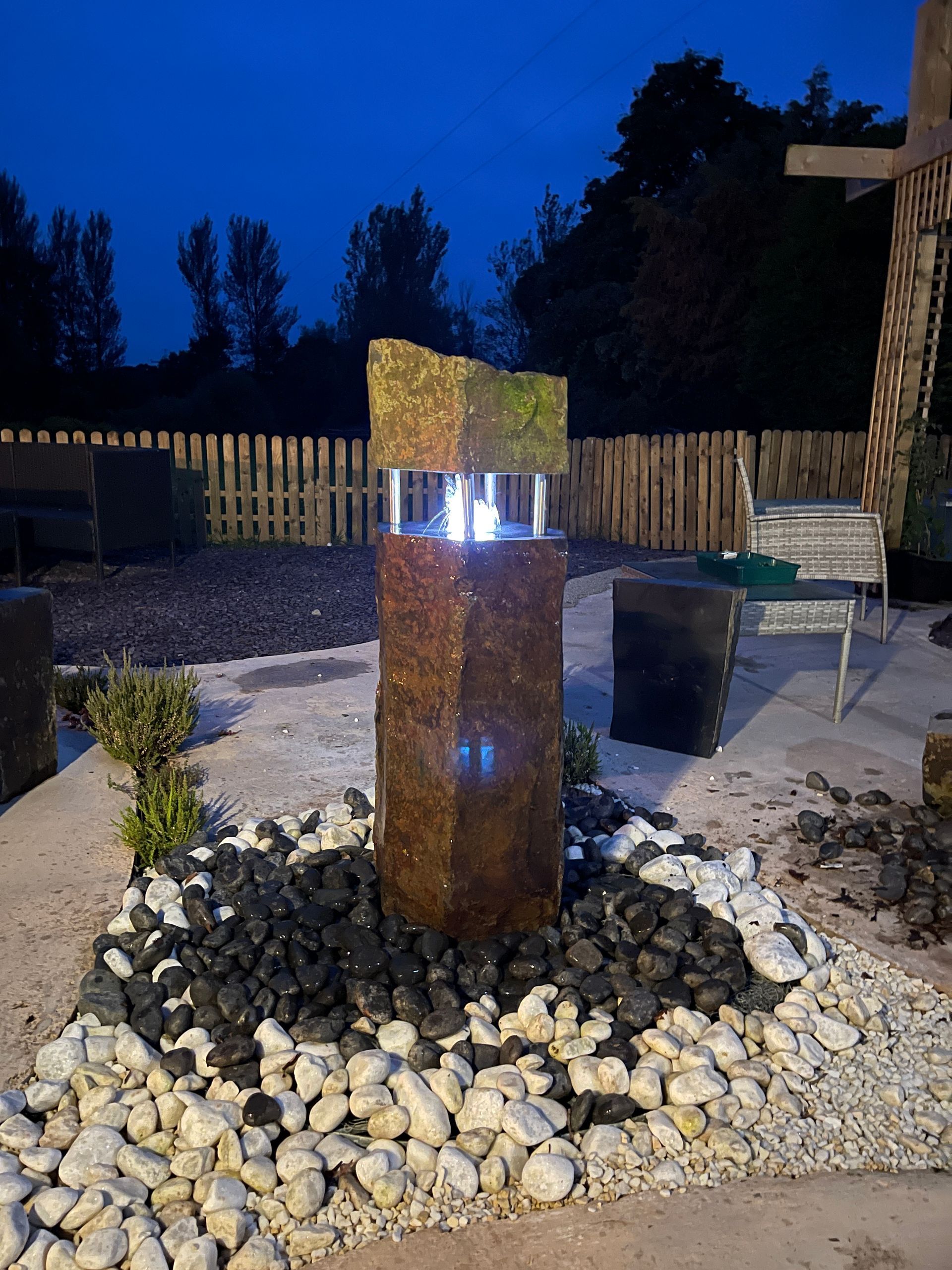 solid basalt beacon of light column water feature