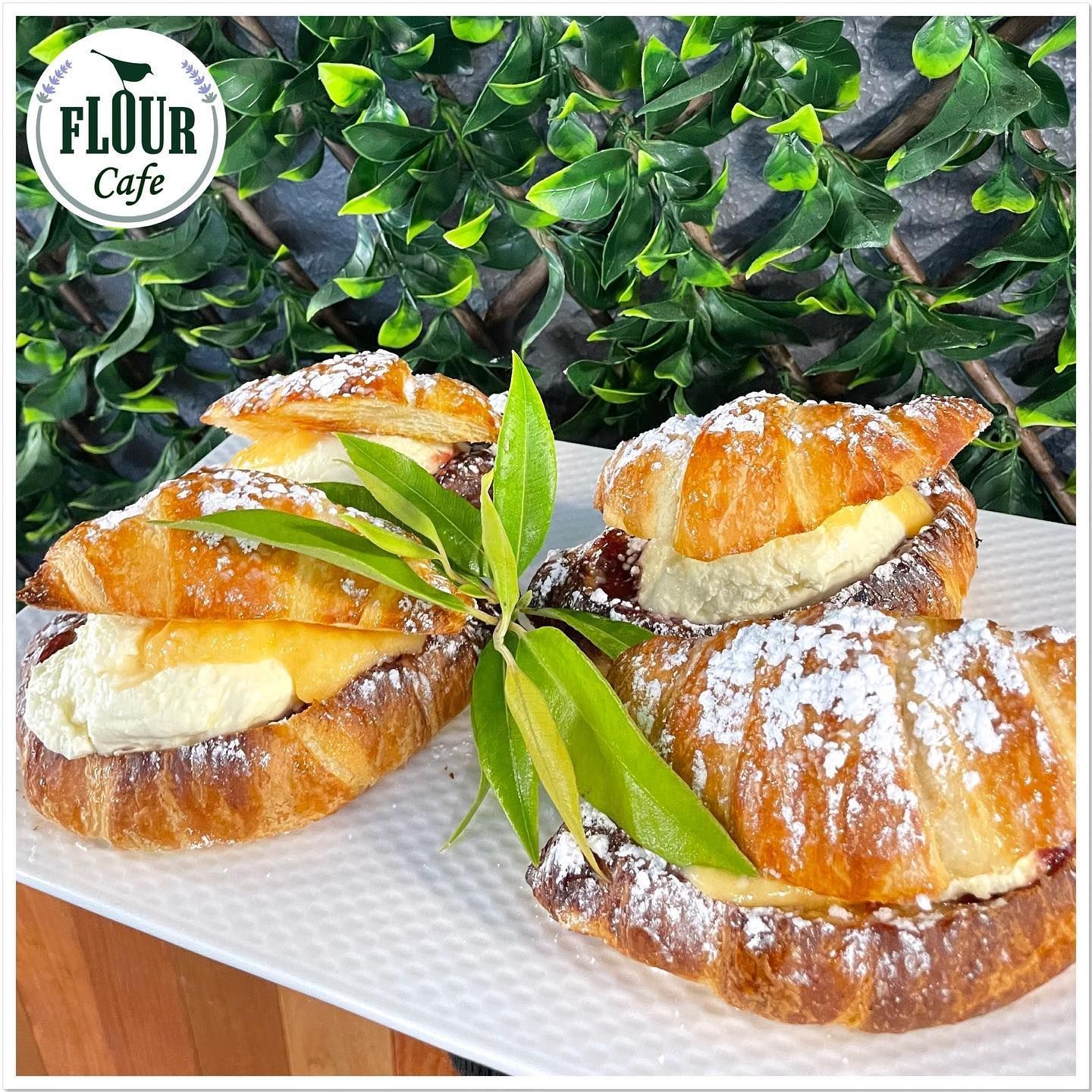 A Four Croissant Sandwiches on a White Plate — Flour in Yeppoon, QLD
