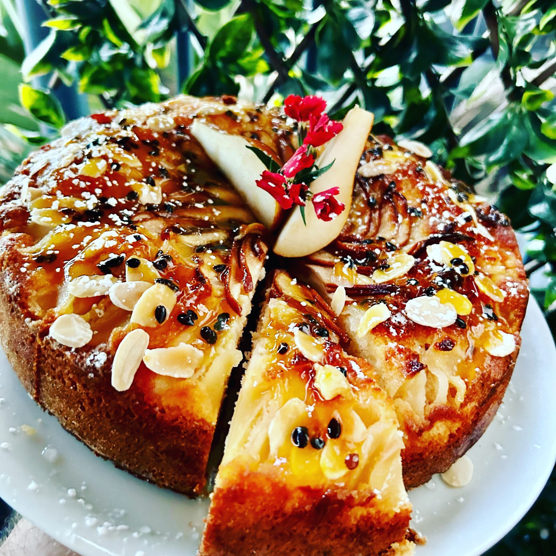 Assorted Cakes and Mini Desserts Decorated With Frosting and Edible Flowers — Flour in Yeppoon, QLD