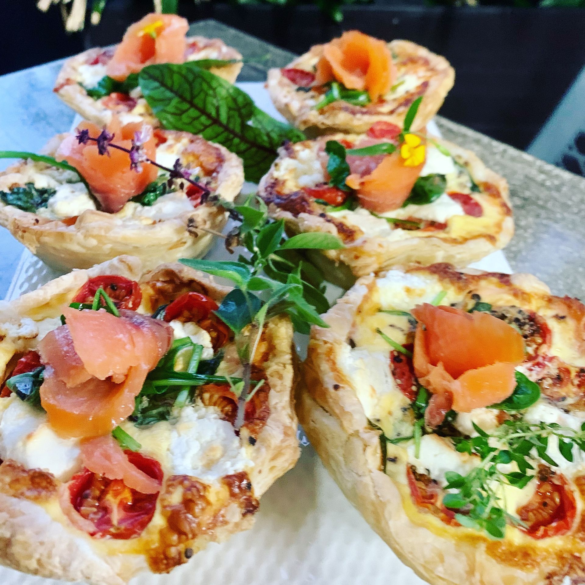 Muffins In Paper Liners Topped With Cream, Blueberries, And Powdered Sugar, In A Baking Pan — Flour in Yeppoon, QLD