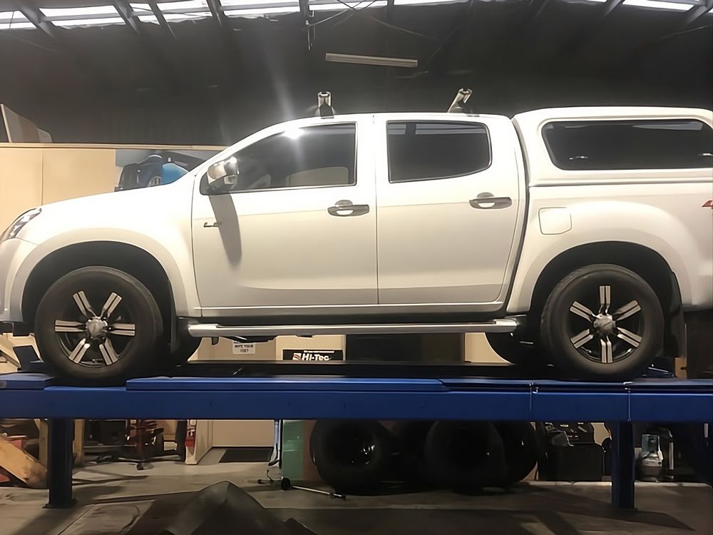 Vehicle in A Lift for Brake and Clutch Inspection
