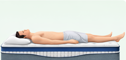 Persona sdraiata su un materasso, con la testa appoggiata su un cuscino. Il materasso è blu e bianco, l'ambiente è di un verde chiaro uniforme.