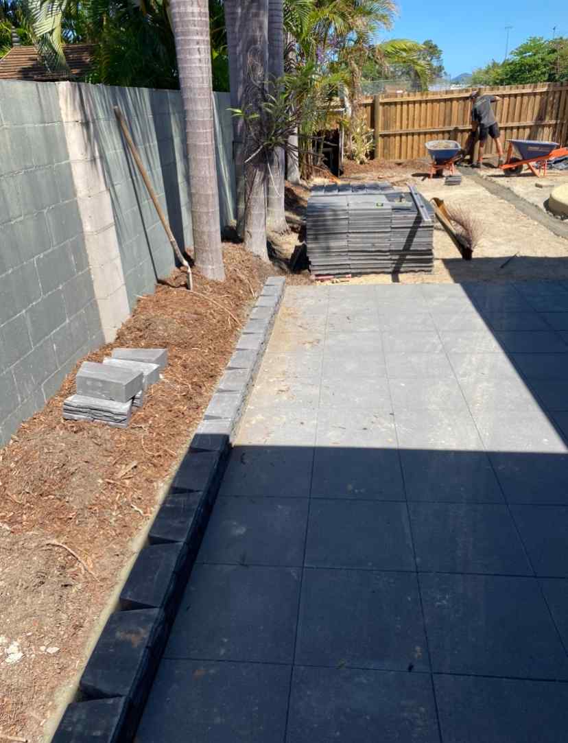 Backyard Concrete Pavers During Installation — Trinity Landscape in Cairns, QLD