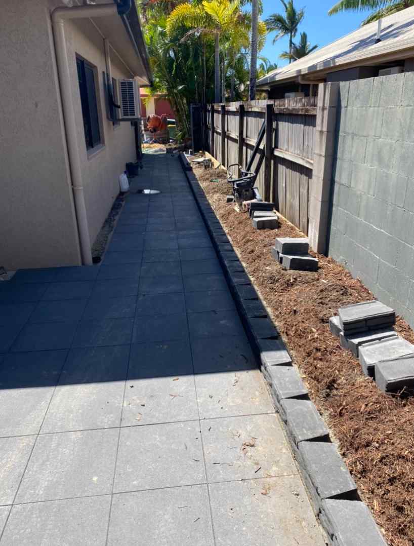 Backyard After Concrete Pavers Installed— Trinity Landscape in Cairns, QLD