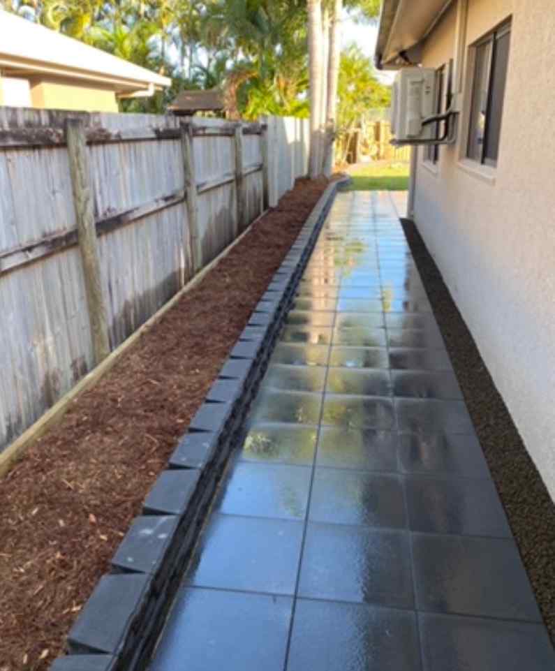 Side of House with Installed Concrete Pavers & Garden Bed — Trinity Landscape in Cairns, QLD
