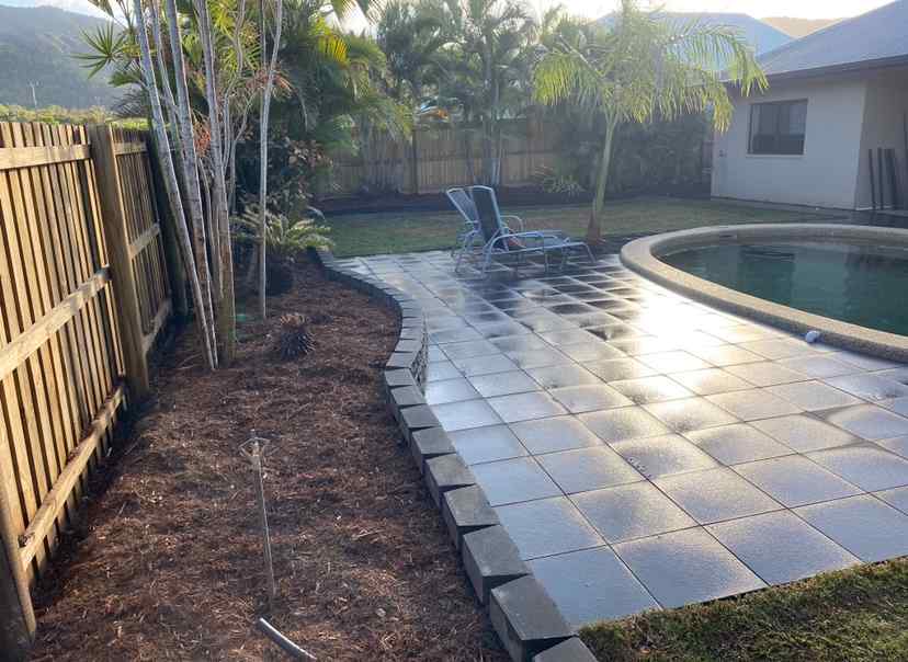 Concrete Pavers & Garden Bed with Red Mulch — Trinity Landscape in Cairns, QLD