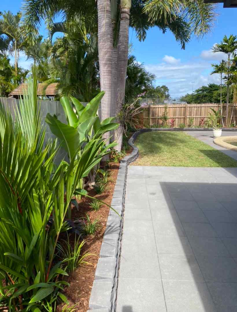 Landscaped Garden with Native Plants in Garden Bed — Trinity Landscape in Cairns, QLD