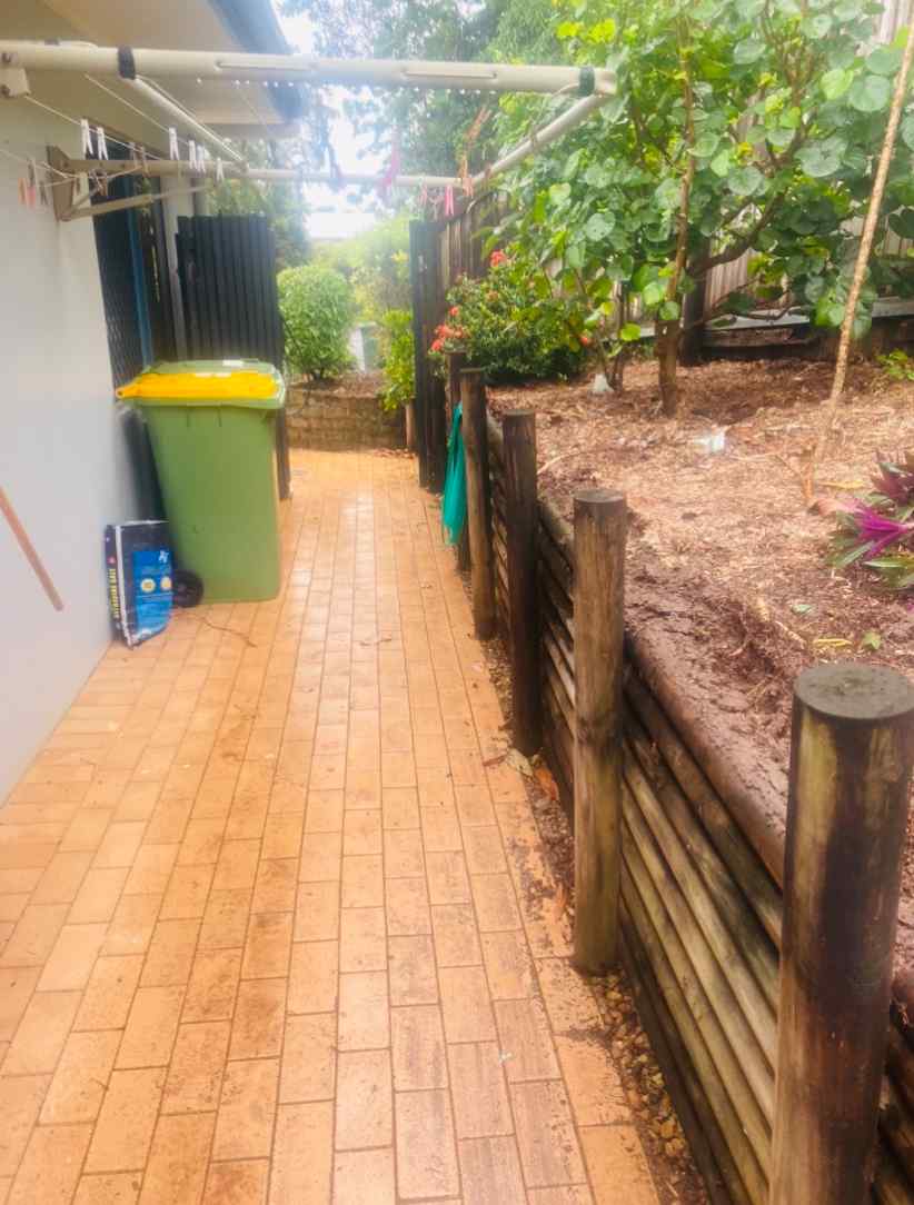 Orange Concrete Pavers on Side of House — Trinity Landscape in Cairns, QLD