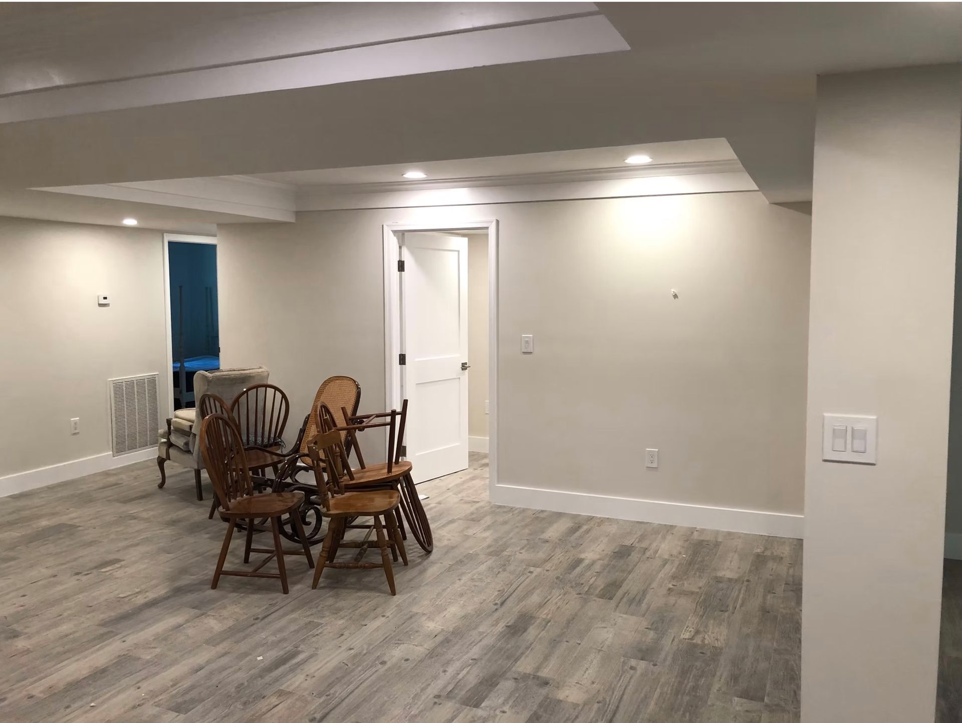 A basement renovation in Arlington, VA that is a movie room by L&R Contractors