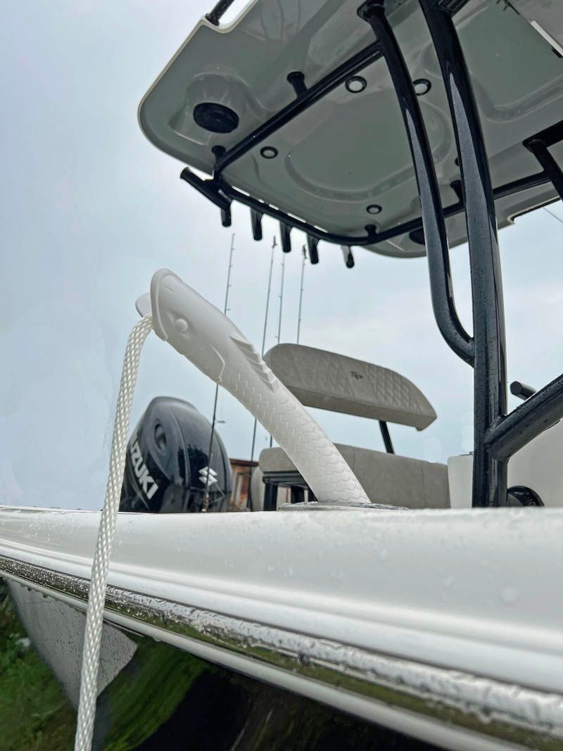 A close up of a boat with a rope attached to it.