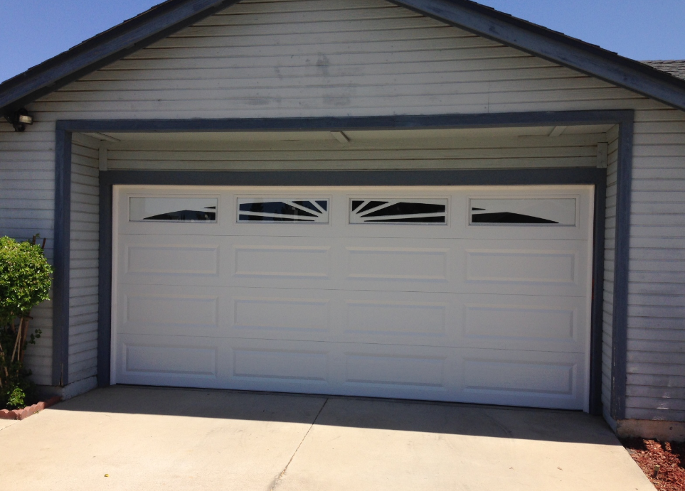 A white garage door with a zebra print on it