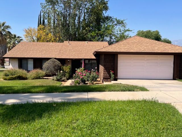 Basic white garage door istallation sold by Lloyd Copelan Garage Doors Redlands, CA
