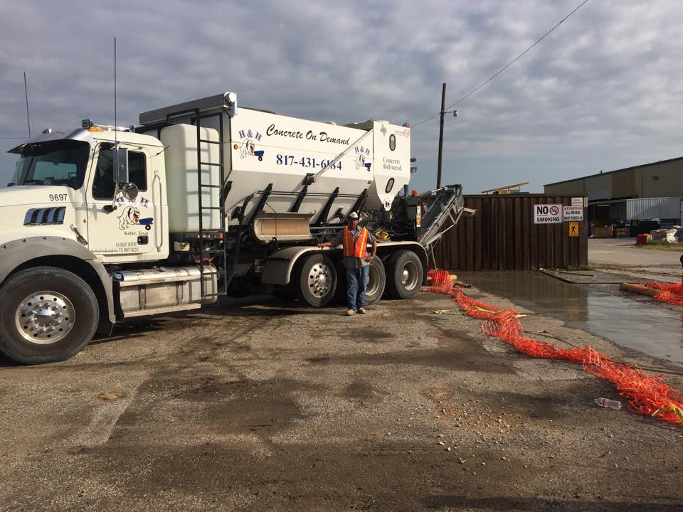 Worker Standing Next To A White Truck — Fort Worth, TX — H & H Concrete On Demand