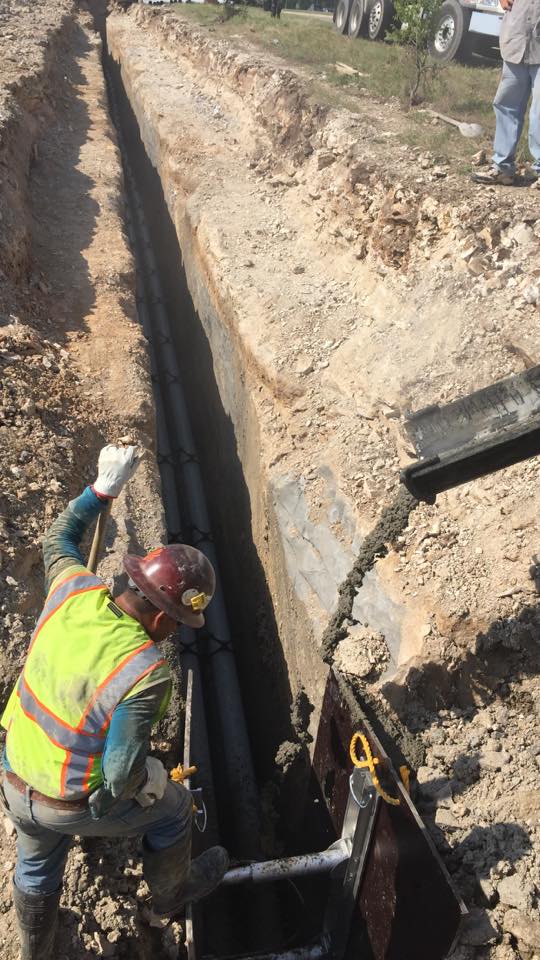 Pouring Concrete On The Road — Fort Worth, TX — H & H Concrete On Demand