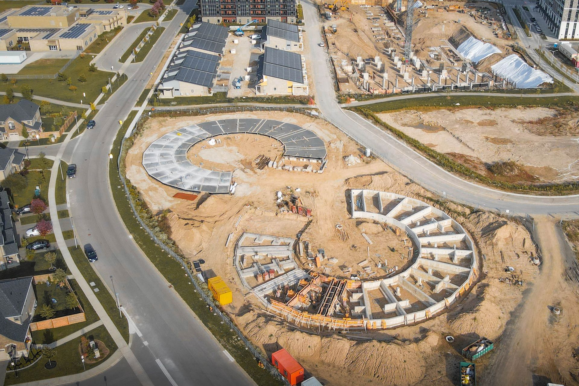 an aerial view of a construction site with a large circle in the middle .