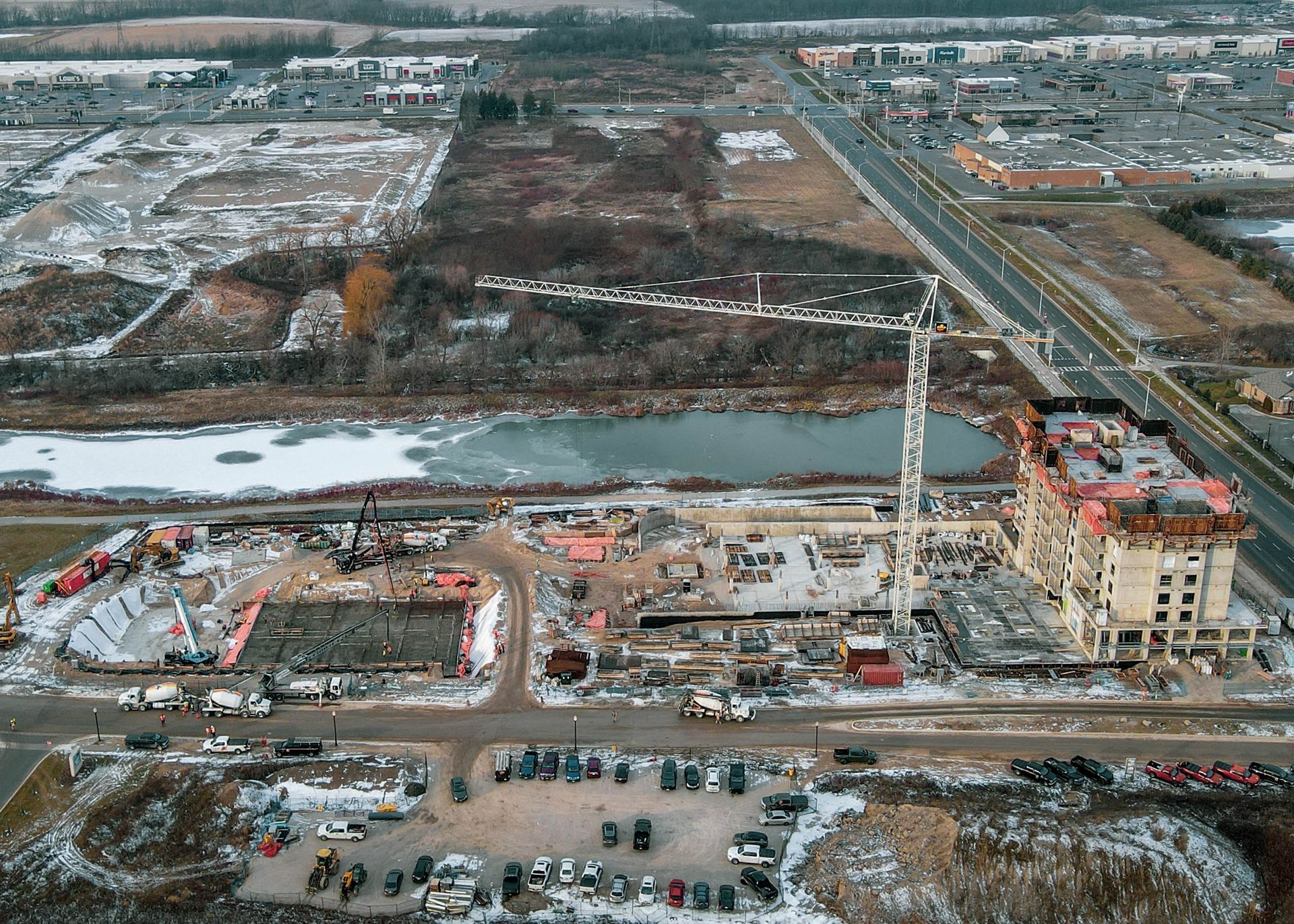 an aerial view of a construction site with a large building under construction .