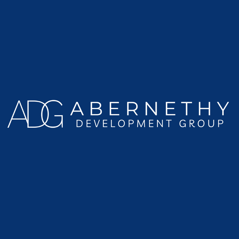 Logo for Abernethy Development Group: White text on blue background.