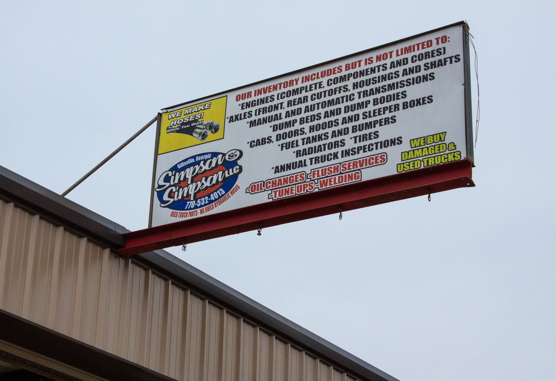 Banner Outside the Shop — Gillsville, GA — Simpson & Simpson LLC