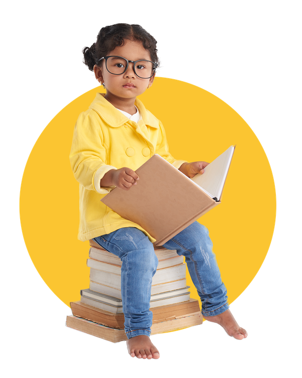Smart Kid Reading a Book — Bridgeport, CT — Donna's Little Doves Inc.