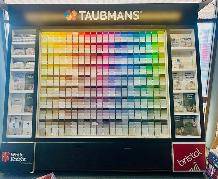 A Display of Taubmans and Bristol Paints in A Store — Taree Paint Centre in Taree, NSW