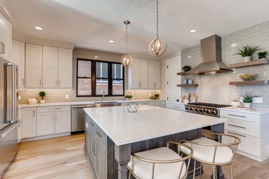 There is a large island in the middle of the kitchen