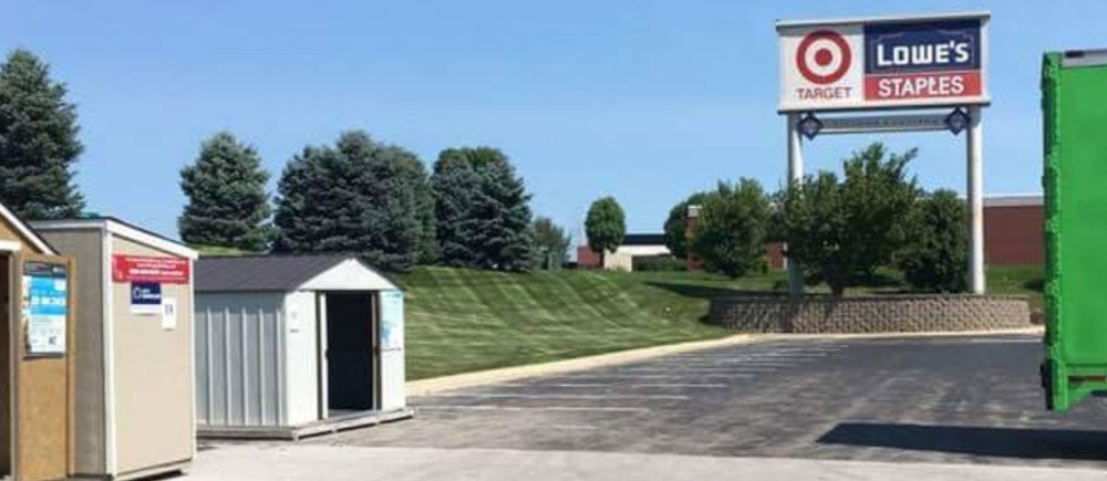 A lowe 's store with a green screen in front of it.