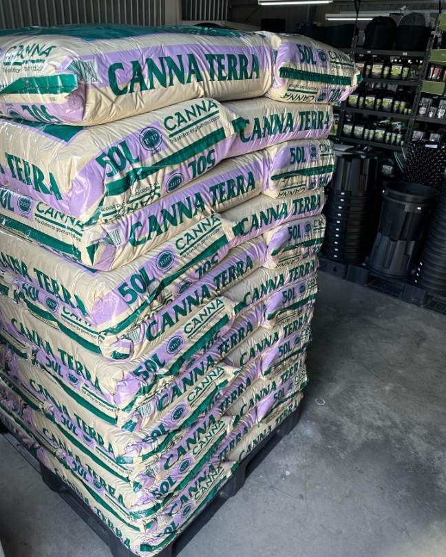 A Pile of Canna Terra Bags Stacked on Top of Each Other on a Pallet — Wide Bay Hydroponics In Maryborough, QLD