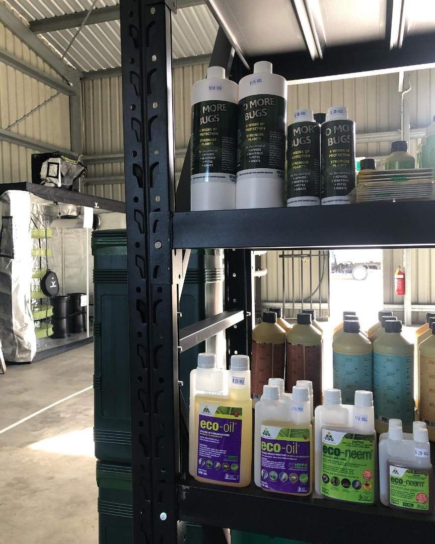 A Shelf Filled With Bottles of Chemicals in a Warehouse — Wide Bay Hydroponics In Bundaberg, QLD