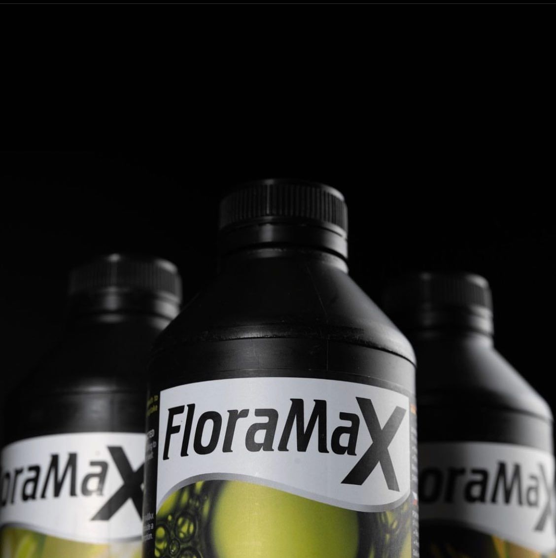 Three Bottles of Floramax Are Lined Up in a Row — Wide Bay Hydroponics In Hervey Bay, QLD