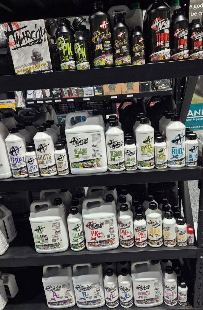 A Store Shelf Filled With Lots of Bottles of Chemicals — Wide Bay Hydroponics In Hervey Bay, QLD