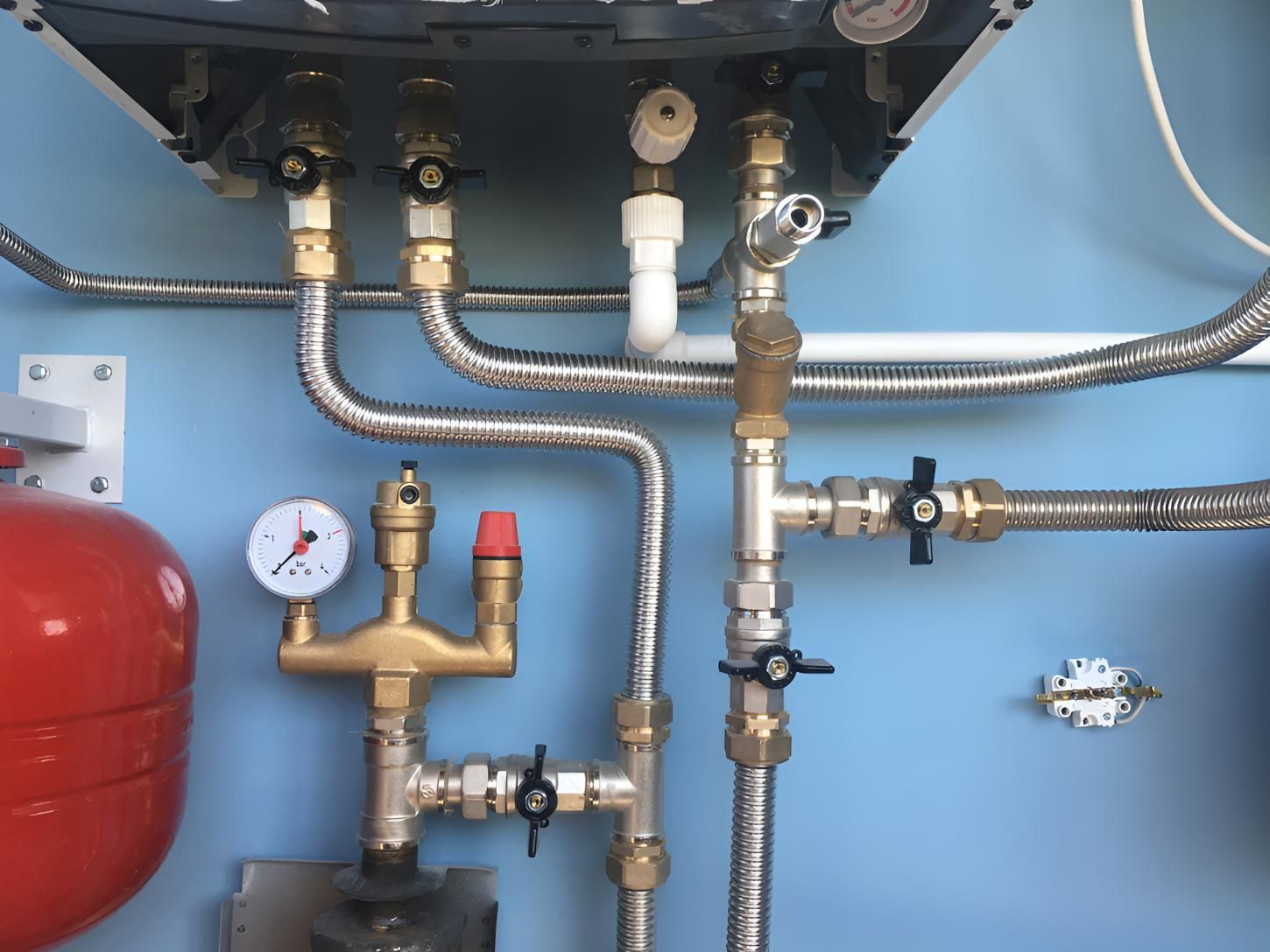 A Close Up Of A Boiler With Pipes And Valves — Wide Bay Hydroponics In Saint Helens, QLD