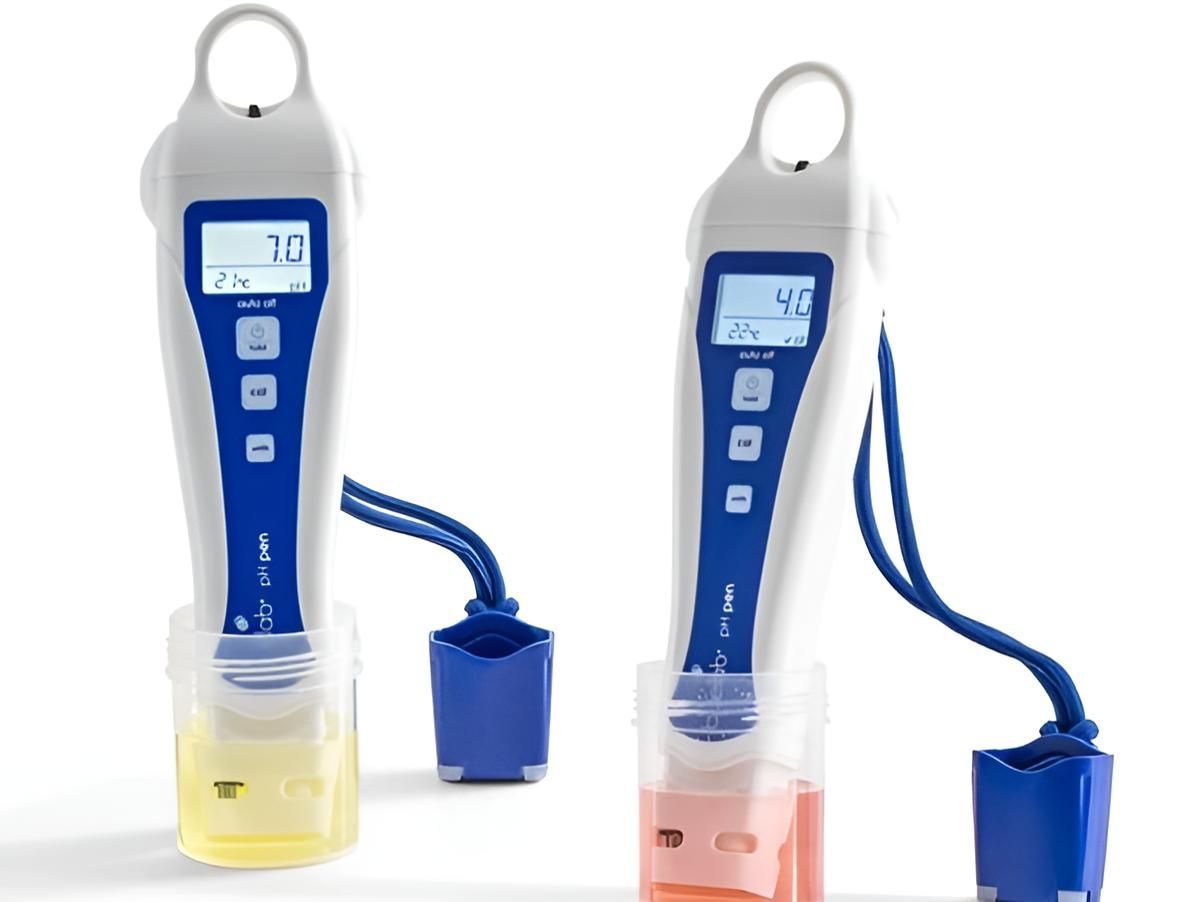 Two Digital Ph Meters Are Sitting Next To Each Other — Wide Bay Hydroponics In Saint Helens, QLD