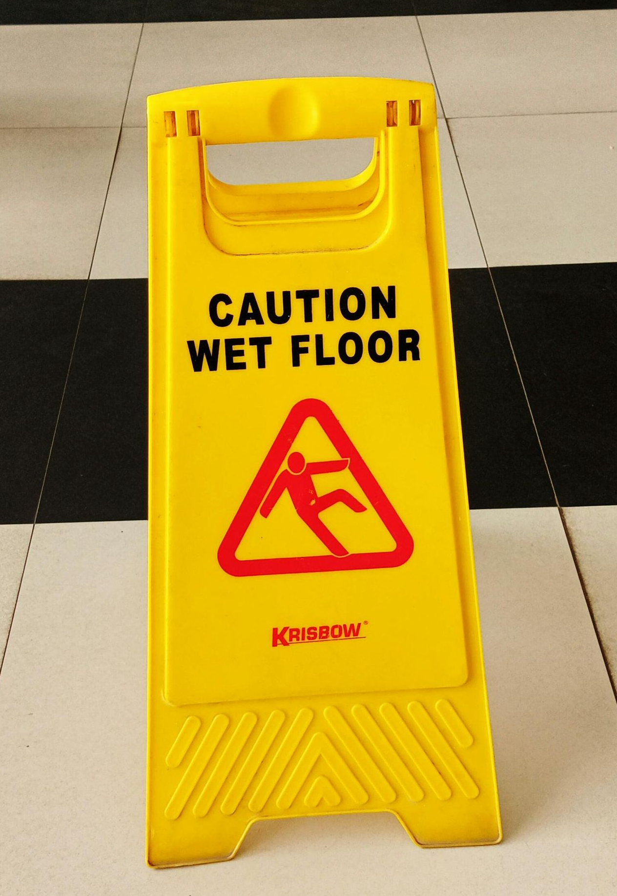 Caution Wet Floor yellow sign