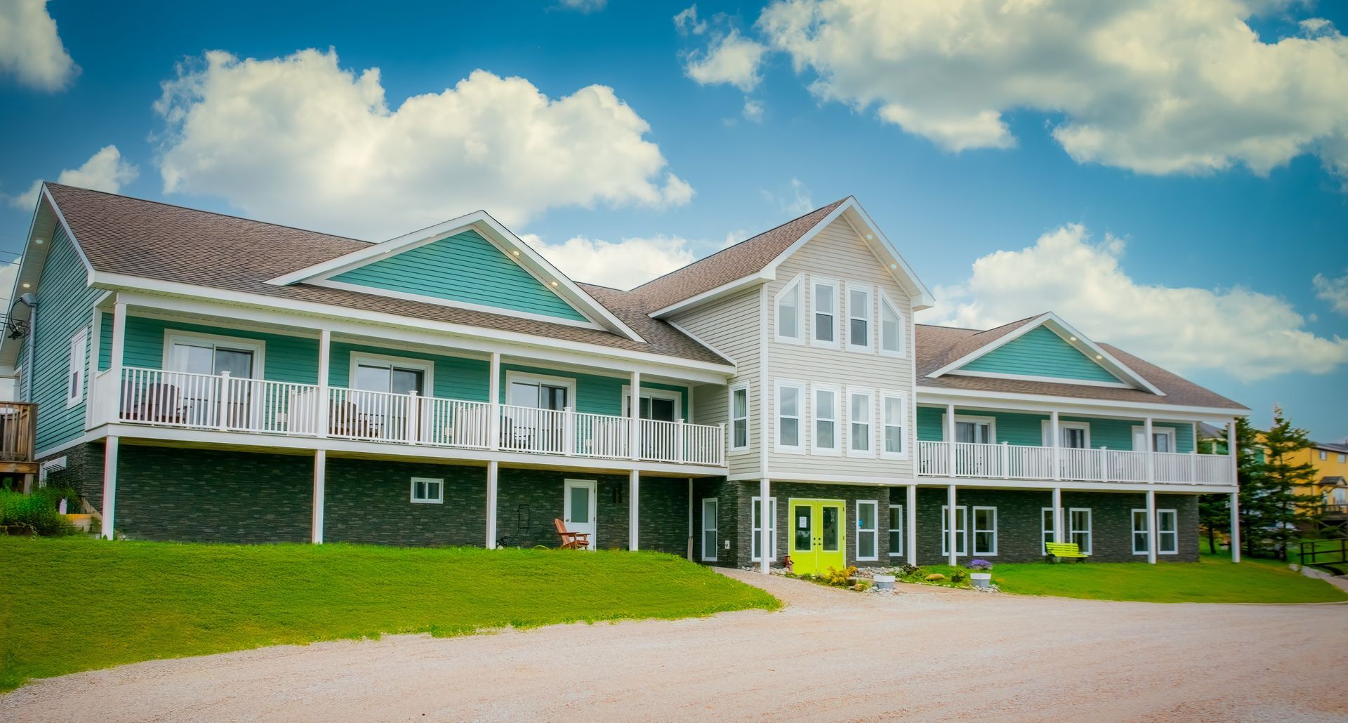 A large house with a lot of windows and balconies