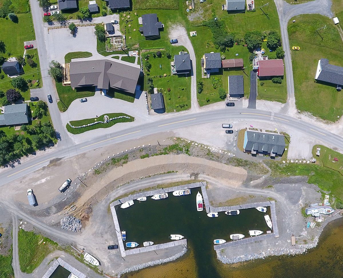 An aerial view of a marina with boats in it