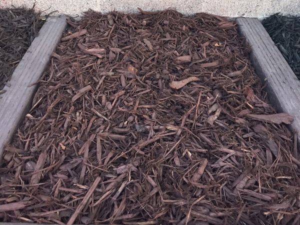 Dark Brown Colored Mulch for sale in Salt Lake City - Mark's Lawn and Garden Supply